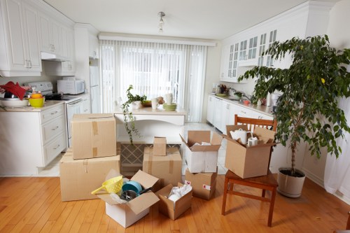 Furniture being carefully loaded for a flat removal in Holland Park