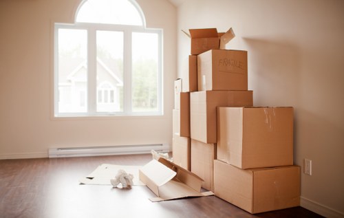Removalists working on a family house move in Holland Park