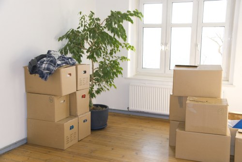 A moving van loaded with household items in Holland Park