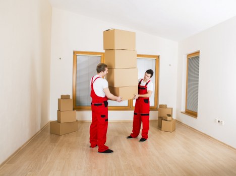 Loading furniture carefully into a moving van